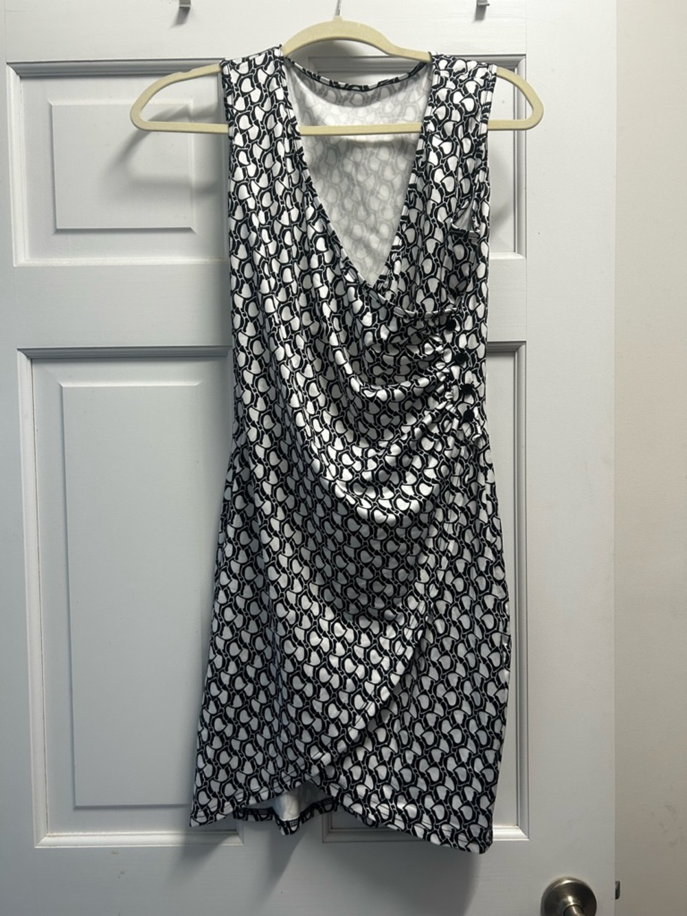Sleeveless Black & White Draped V-Neck Dress